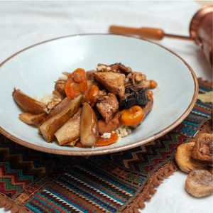 Фото Сочная индейка с сухофруктами, грушей и кускусом